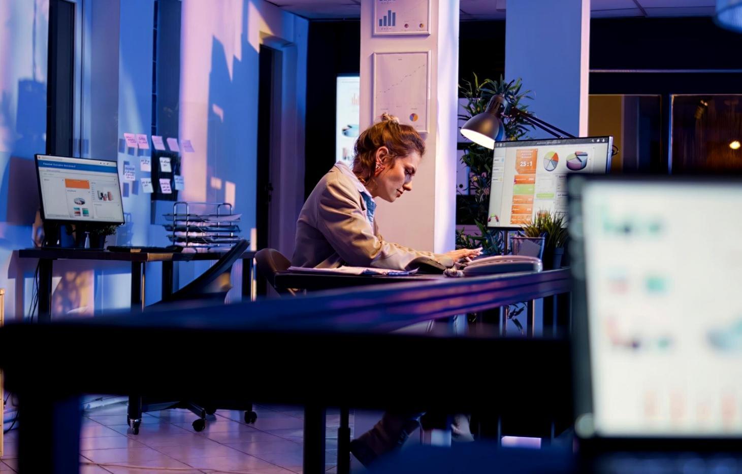 Modern office environment showing expense management workflow